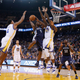 Confidence is not an issue for Draymond Green, seen here playing solid defense but with his face mostly obscured